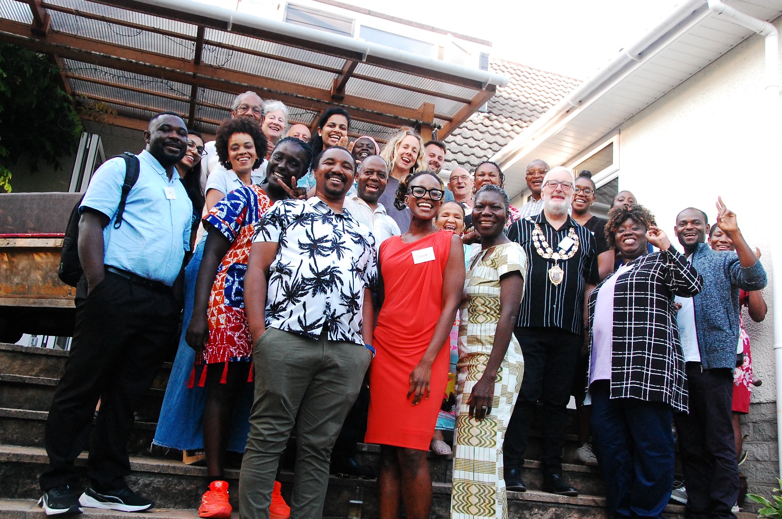 Guests at the BPNS launch gathered together on the steps outside the venue.